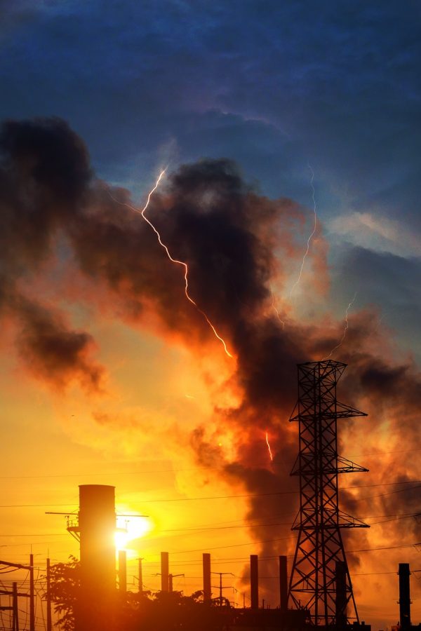 Factory oil and gas industry Dramatic sky sunset and lightning